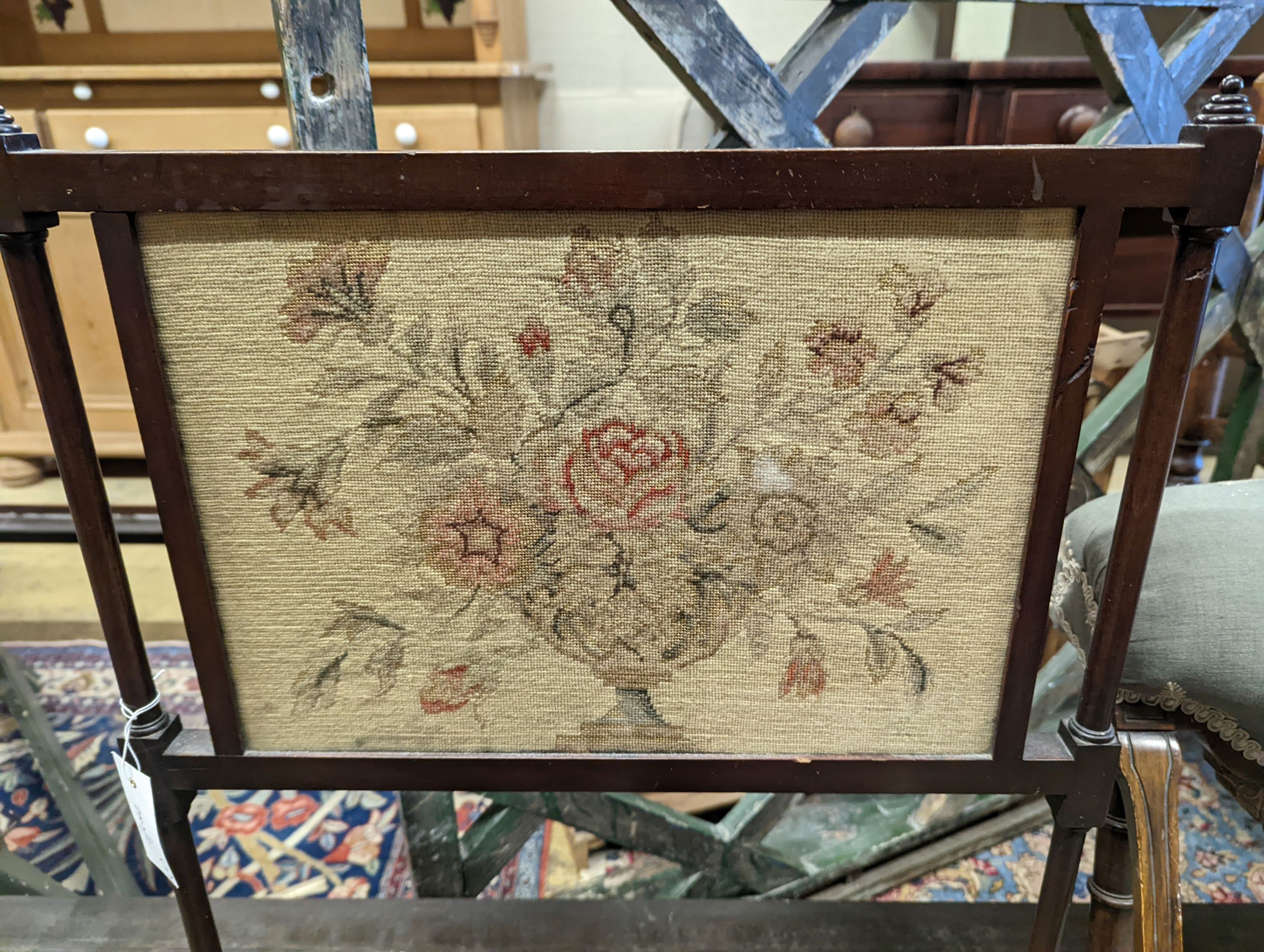 A Victorian upholstered nursing chair, together with a later fire screen